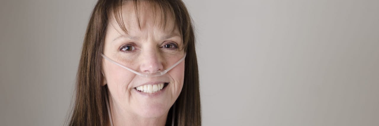How 'Inspiration Porn' Affects Me as Someone With a Chronic Illness Woman wearing oxygen cannula