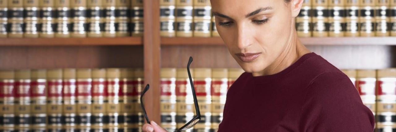 How the Americans With Disabilities Act Led Me to My Future Career Woman reading law books