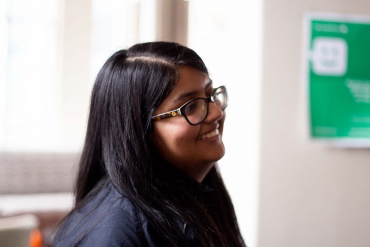 Photo of Ameera, young Muslim person with glasses smiling