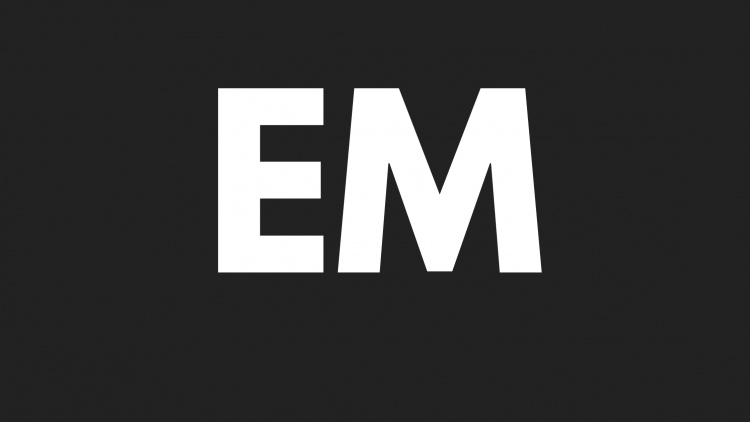 Against an all black background is "Em" in big bold letters