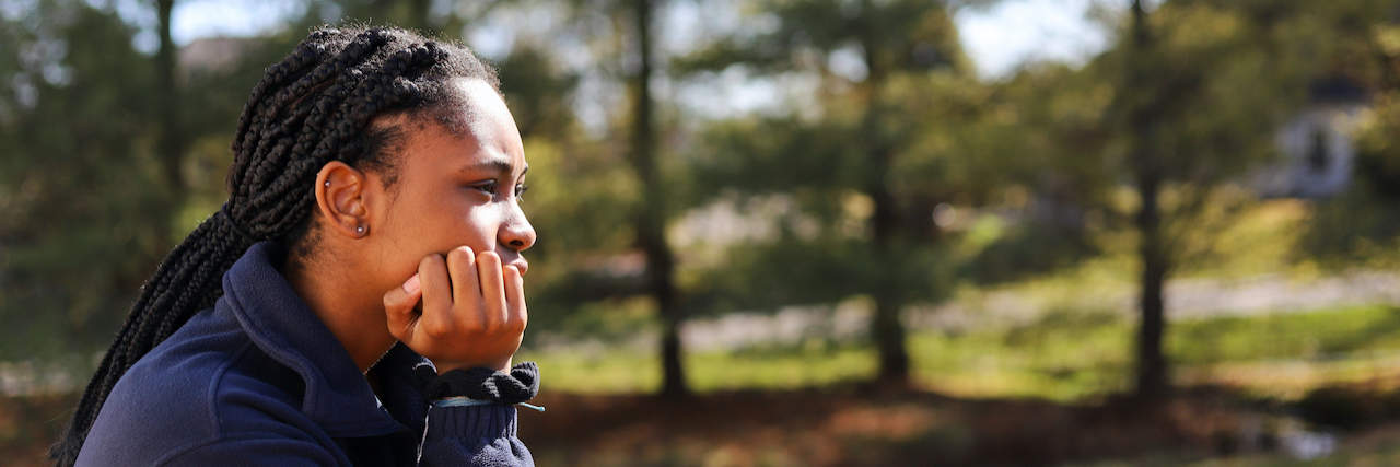 The Problem With Assuming That Abortion Ban Exceptions Will Actually Work Side view of Black teenage girl looking away in deep thought