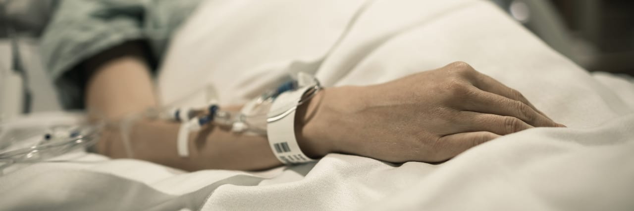 Recovering From a Coma: Why Reducing Medications Can Be Traumatic Sad woman in hospital bed