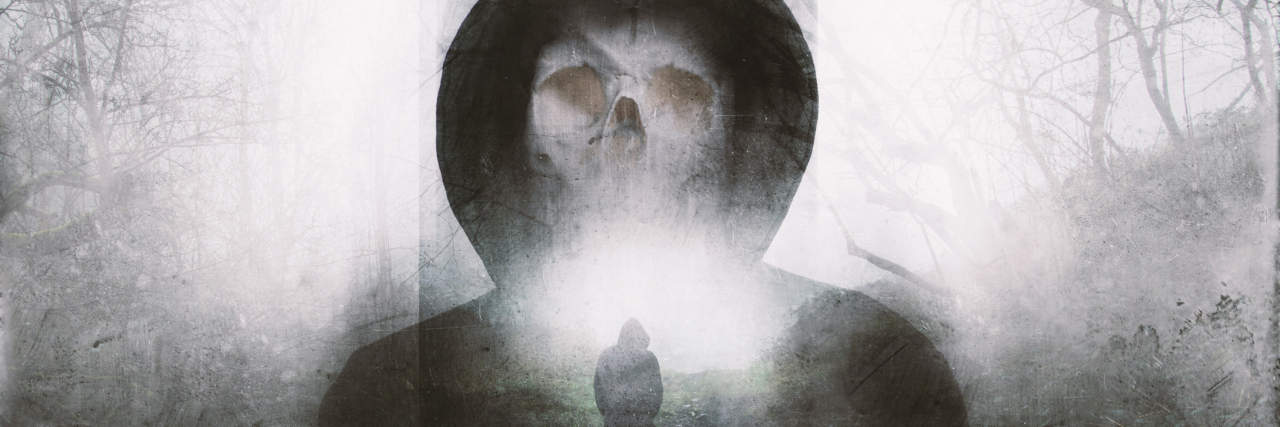 double exposure of a man facing away and a hooded figure in a school mask looming over him