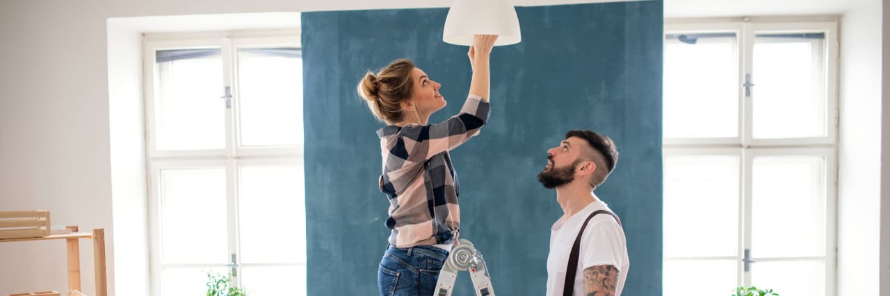Executive Dysfunction: Struggling With Household Tasks Like Changing Light Bulbs photo of a young couple changing a light bulb