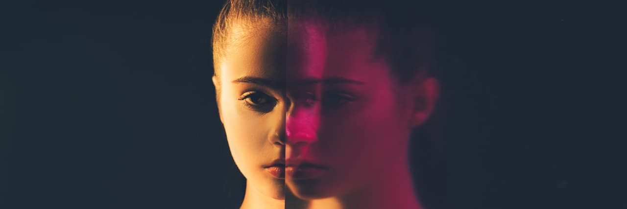 Double exposure silhouette of a young woman looking straight ahead and a mirror reflection
