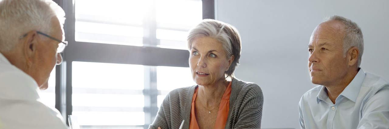 5 Tips to Become Your Own Chronic Illness Advocate Doctor meeting with couple.