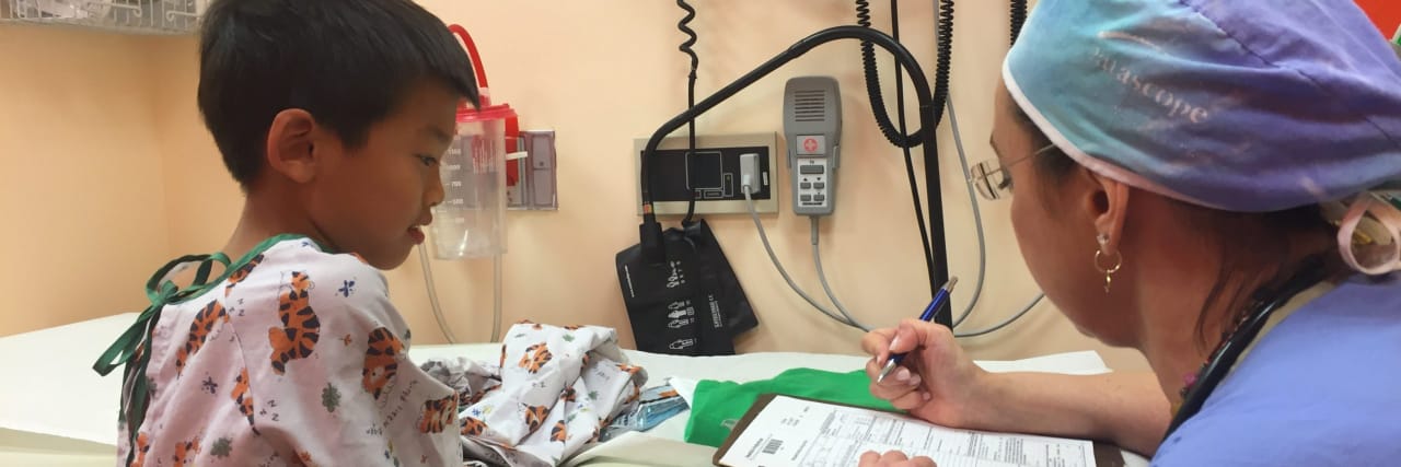 What Makes a Great Doctor for a Patient With Cerebral Palsy Eliott with a doctor as a child.