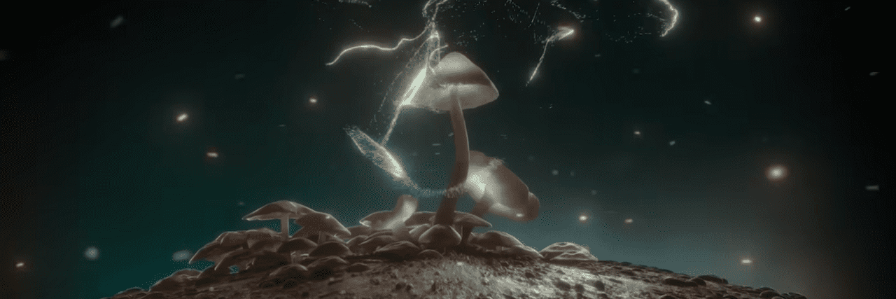 'How to Change Your Mind' -- Key Takeaways About the Future of Psychedelic Mental Health Treatment image of psiocybin or magic mushrooms with added spore effect from the Netflix show How to Change Your Mind