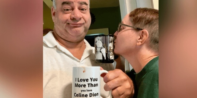Contributor with her husband, holding coffee mugs