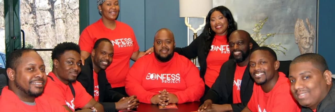 The Confess Project: Barbers Help Black Men Talk About Mental Health Lorenzo Lewis (center) and his team at The Confess Project, pre-pandemic. Photo courtesy of The Confess Project