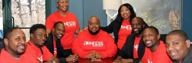 Lorenzo Lewis (center) and his team at The Confess Project, pre-pandemic. Photo courtesy of The Confess Project