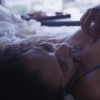Close up of intimate loving couple lying together in bed