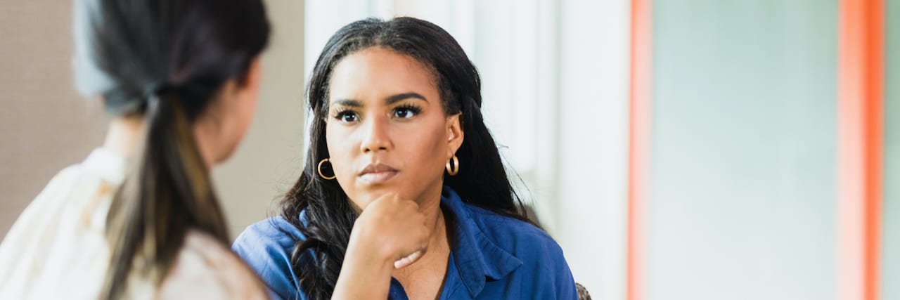 Understanding the Services Different Mental Health Professionals Offer Black therapist listens to a patient