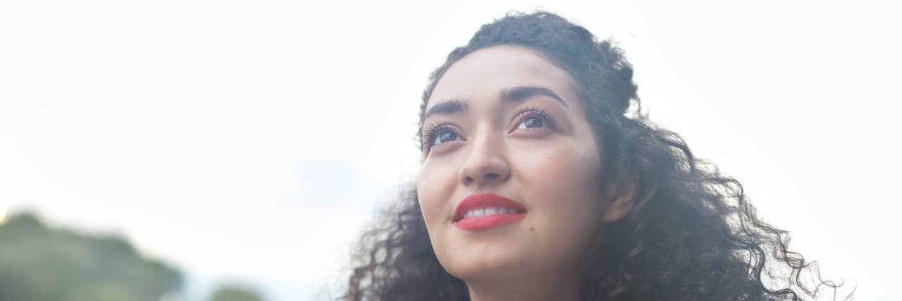 Why Getting My ADHD Diagnosis Gave Me Hope Young woman looking up into the sky