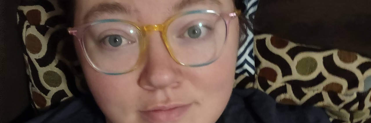 Allie wearing rainbow glasses