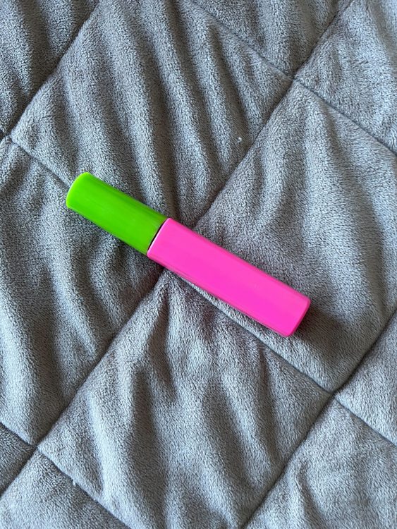 Pink and green tube of mascara