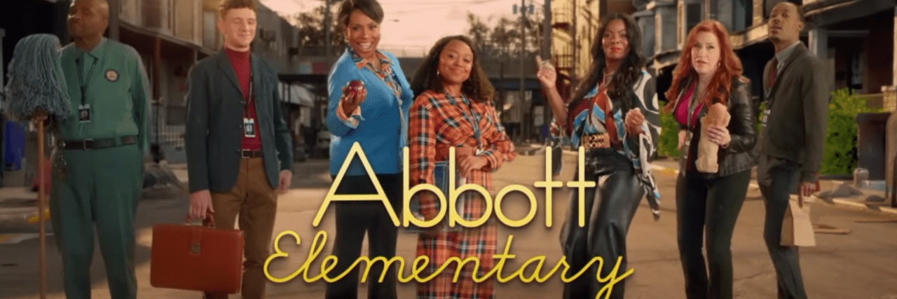 The main cast of "Abbott Elementary" lined up with Philly in the background. In yellow words "Abbott Elementary" is centered and "stream on hulu" is on the bottom of it.