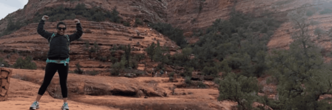 How Bipolar Disorder Shaped My Experience of Motherhood Contributor standing in front of sandstone rock formations in Arizona