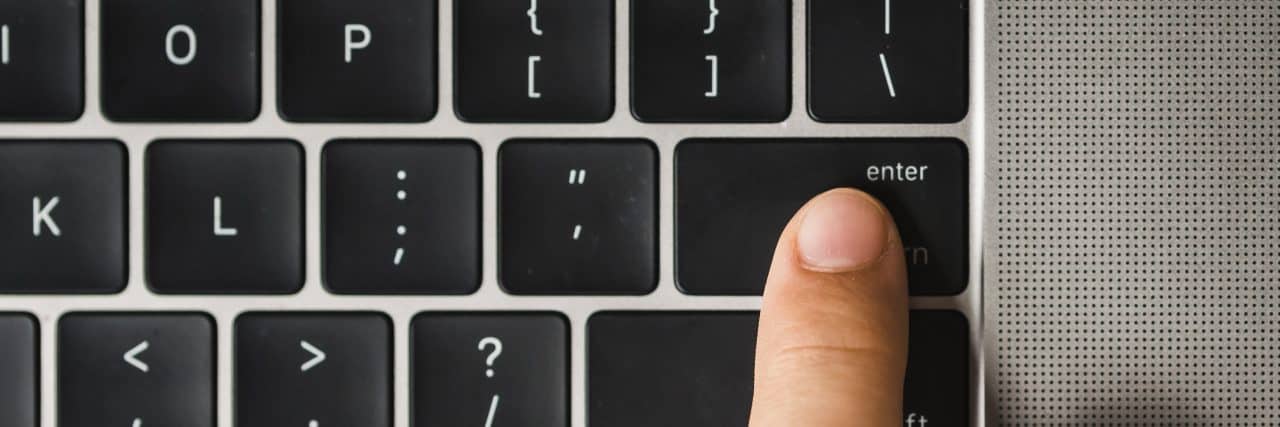 By Being Your Own Advocate, Amazing Things Can Happen Overhead view of cropped finger pressing enter key on laptop computer's keyboard
