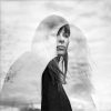 Black and white image/double exposure of woman