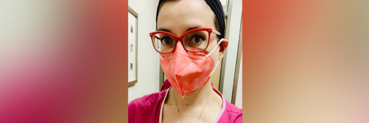 A Better Way for Healthcare Providers to Start the 'Bad News Conversation' Contributor with red glasses, peach mask and pink hospital gown