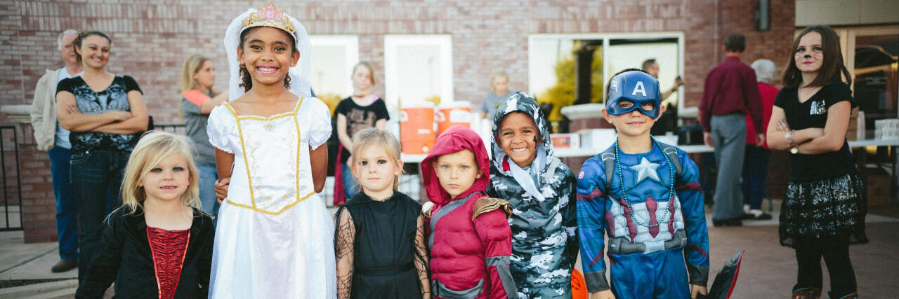 Halloween Costumes for Kids With Sensory Disorders Diverse group of kids wearing Halloween costumes