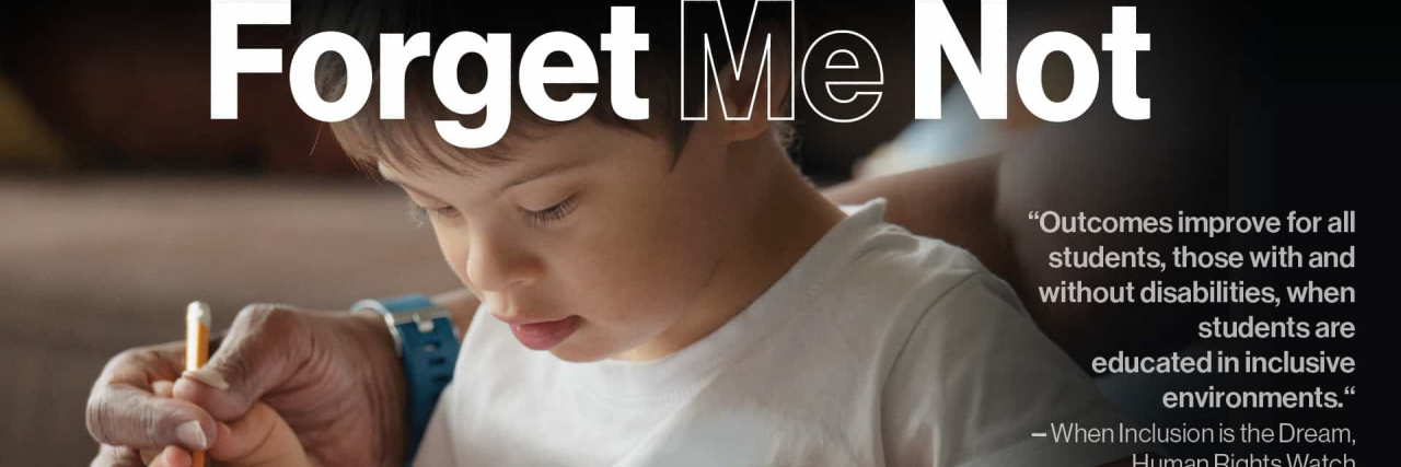 Enlightening Documentary ‘Forget Me Not: Inclusion in the Classroom’ Released   A boy with Down syndrome sits at a desk with teacher's arms helping him