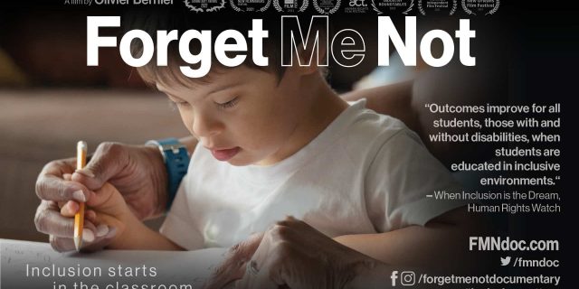 Enlightening Documentary ‘Forget Me Not: Inclusion in the Classroom’ Released   A boy with Down syndrome sits at a desk with teacher's arms helping him
