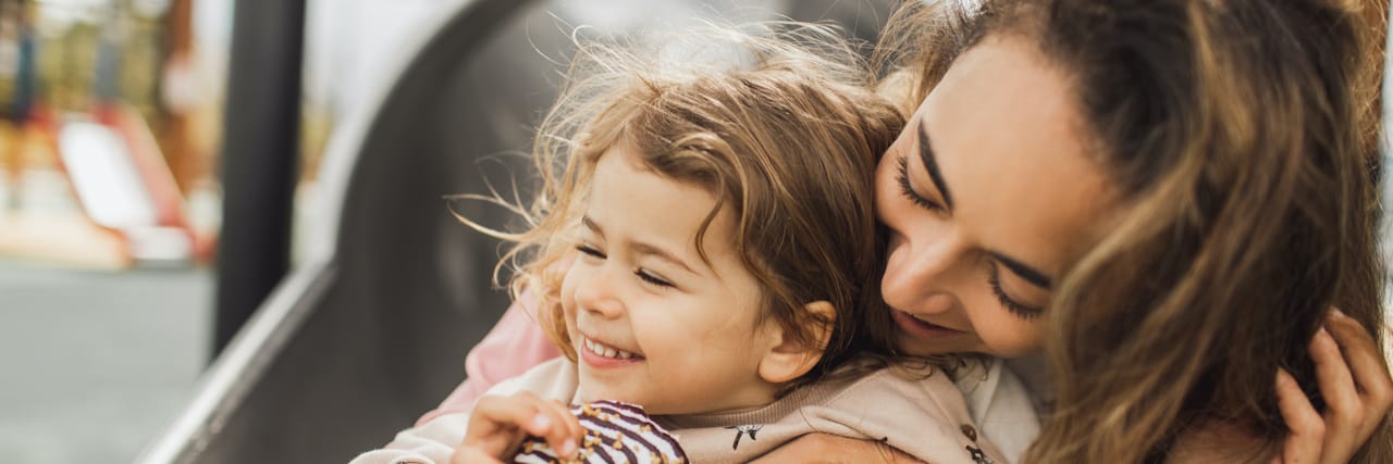 The Right and Wrong Way for Medical Professionals to Give a Child's Rare Disease Diagnosis Mother and daughter laughing on playground