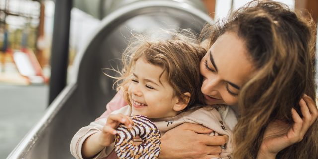 When Your Child Is Diagnosed With Achondroplasia: What Comes Next Mother and daughter laughing on playground