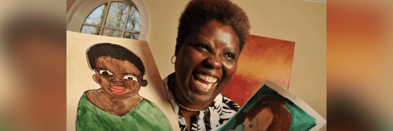Honoring Disability Advocate Lois Curtis and the Supreme Court Case That Changed History Disability advocate and Black woman Lois Curtis holding two paintings and smiling