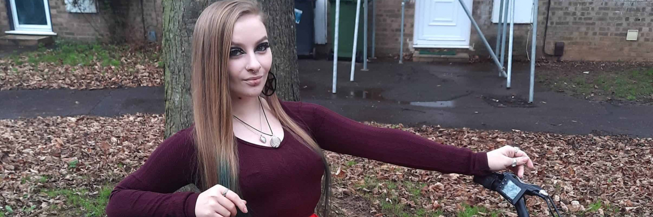 My Life as a Beauty Queen Battling Functional Neurological Disorder (FND) Contributor looking stylish while sitting in wheelchair /scooter mobility device