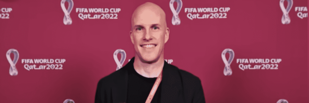 The Negative Impact of Conspiracy Theories on Rare Disease and Diagnoses Grant Wahl in front of a red World Cup background