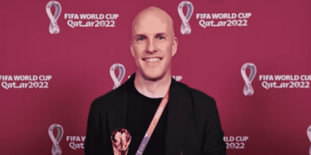 The Impact of Conspiracy Theories on Rare Disease and Diagnoses Grant Wahl in front of a red World Cup background