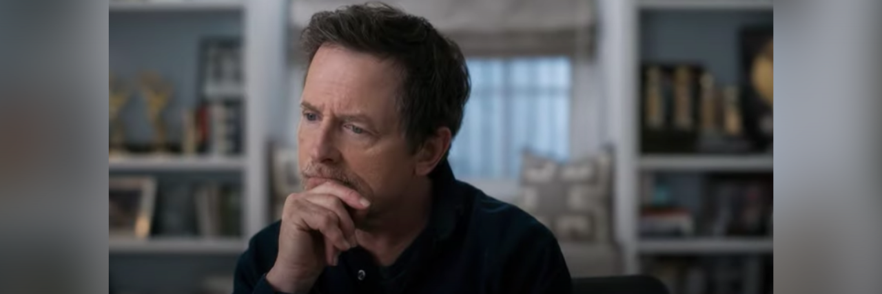 Photo of Michael J. Fox from new documentary looking thoughtful
