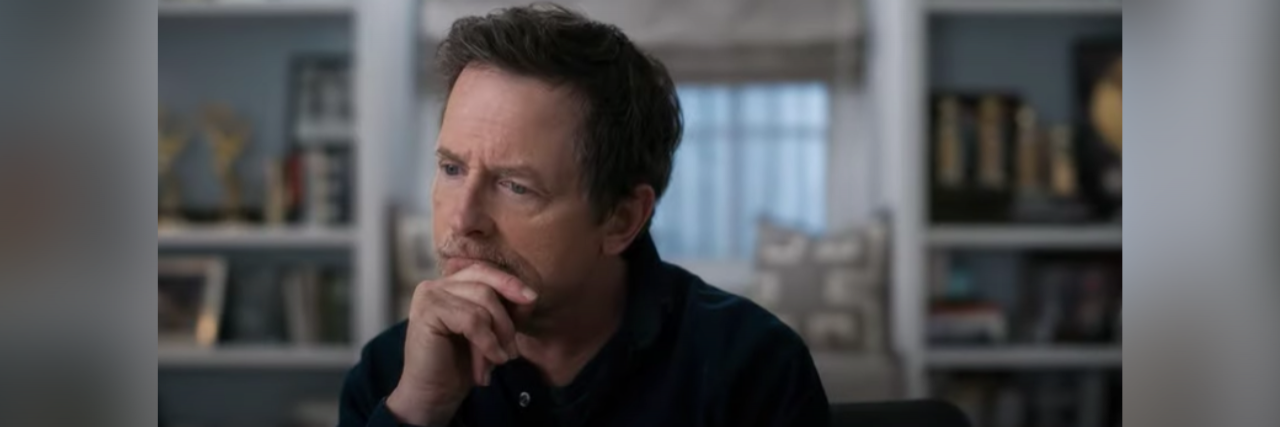 Owning Your Narrative With 'Still: A Michael J. Fox Movie' Photo of Michael J. Fox from new documentary looking thoughtful
