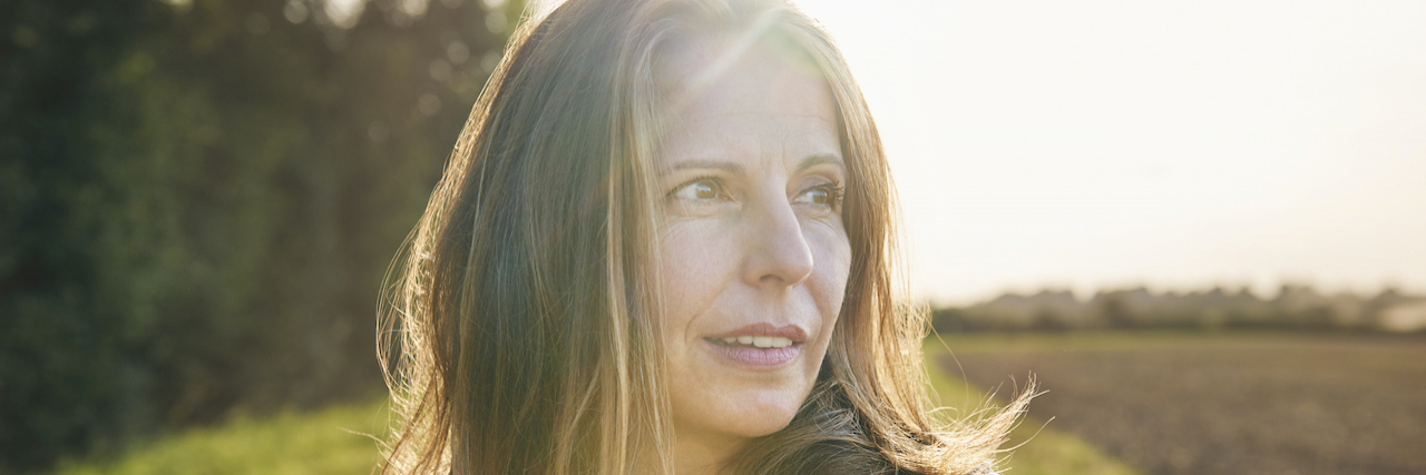 How Much Can You Control Your Emotions With Mental Illness? Portrait of mature woman in the countryside