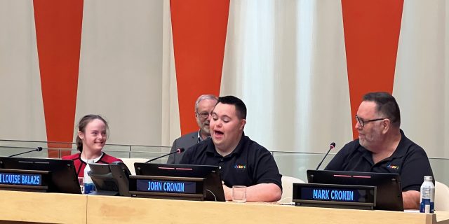 Entrepreneur and Self-Advocate With Down Syndrome Speaks at United Nations John Cronin speaking at the United Nations