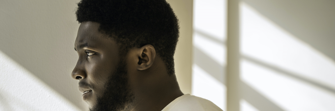 5 Ways I Cope With Rejection Sensitivity Dysphoria and Autism Side portrait of a Black man
