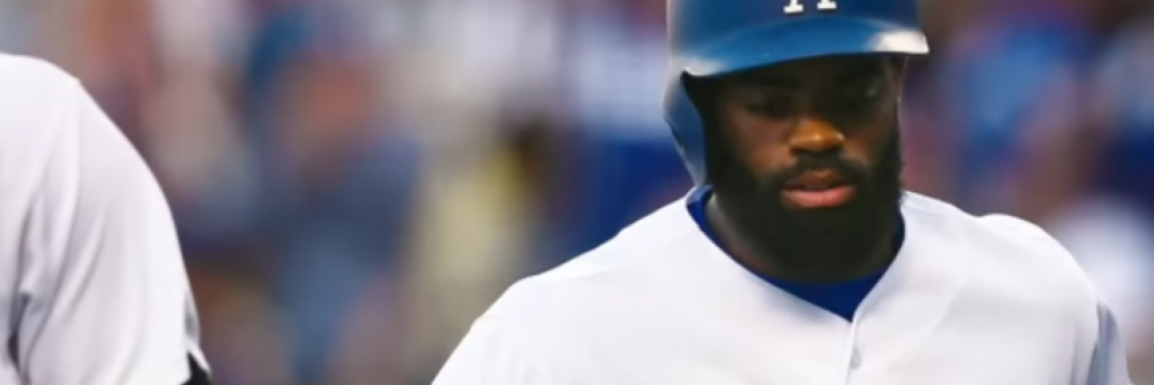 The Dodgers Re-Signing a Player With Schizophrenia Is Complicated Dodgers player Andrew Toles in a game with batting helmet on