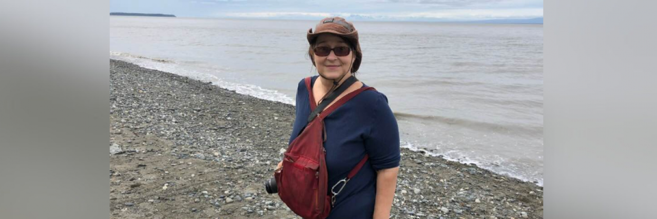 Contributor in Alaska wearing sunglasses on the beach