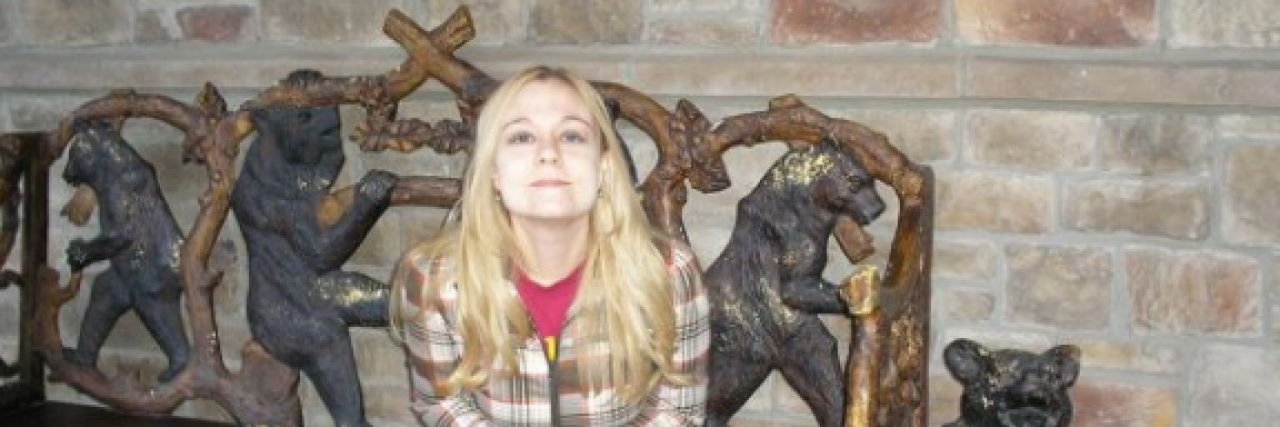 What New Research on Behçet’s Tells Us About This Rare Disease Contributor sitting on bench with her legs crossed