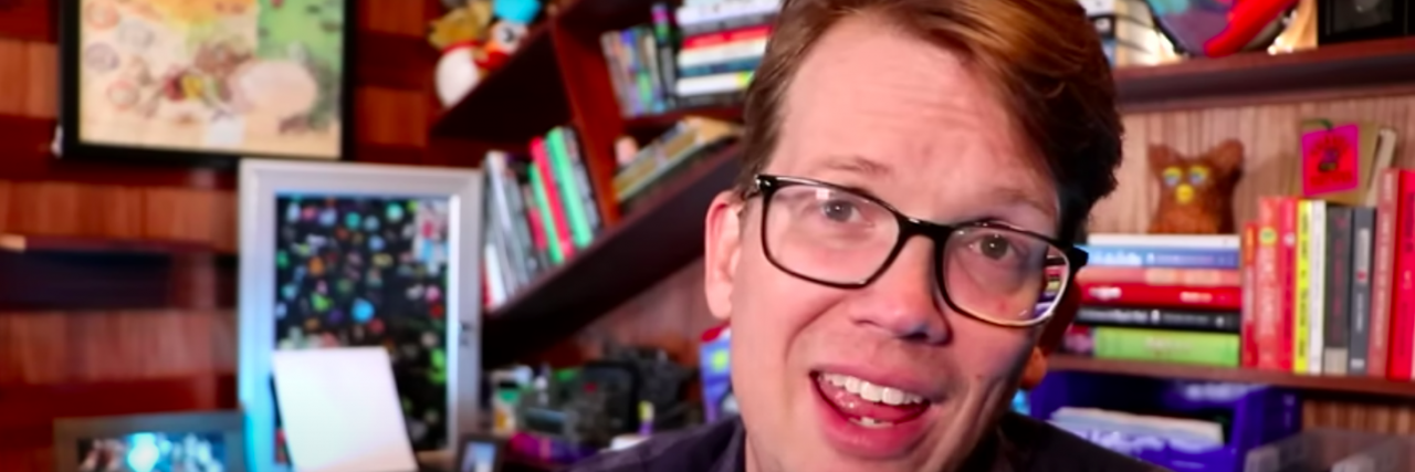How Author and YouTuber Hank Green Chose to Share His Cancer Diagnosis Hank Green speaking in Vlog