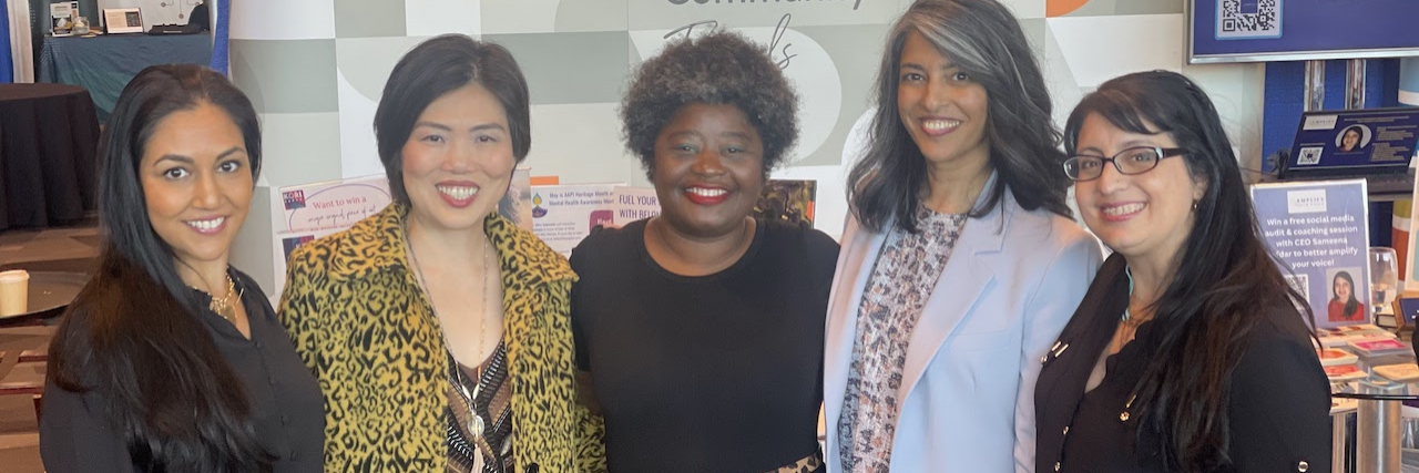 What Community Support Means With Chronic Migraine Contributor with diverse group at migraine conference