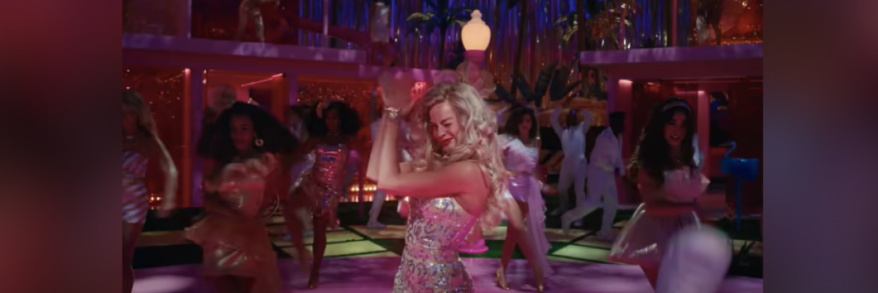 Why I Needed to See The "Barbie" Movie Twice Barbie (played by Margot Robbie) clapping her hands in dance number from film