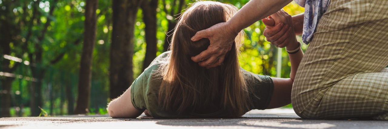 What Are the 15 Types of Dysautonomia? Fainted girl helped by an old woman – Teenager trying to get back on her feet while receiving support from an elder