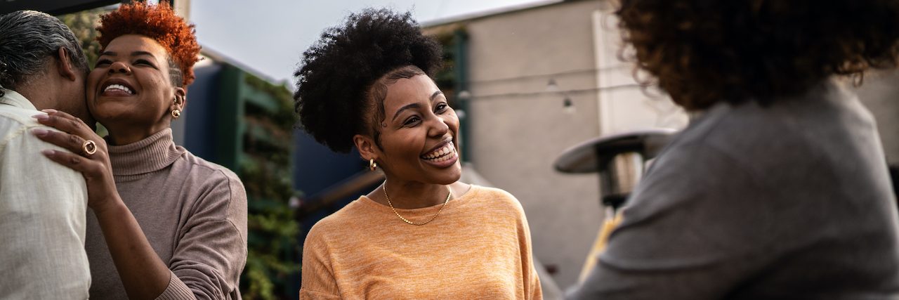 Empowering the Black Community Black woman greeting friends