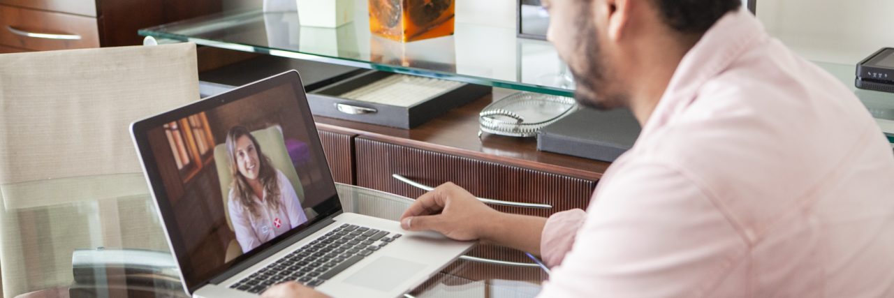 What Type of Therapy Do I Need A young man doing online psychotherapy at home
