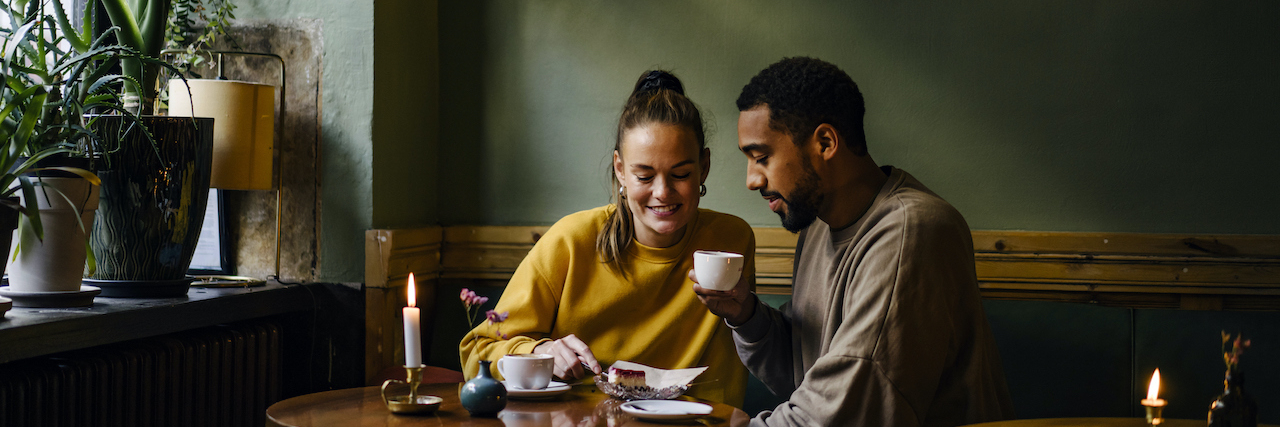 Navigating Love and Life: How Does ADHD Affect Relationships? Couple close together in a cafe