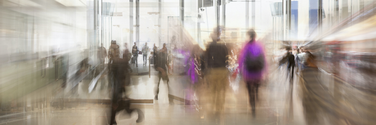 Does Migraine Cause Blurred Vision? Understanding the Link Blurred people walking in lobby